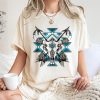 Bull Skull With Leopard Print, Feathers, And Crossed Arrows On Southwestern Geometric Background T-Shirt